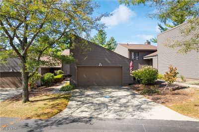 View of front facade featuring a garage | Image 1