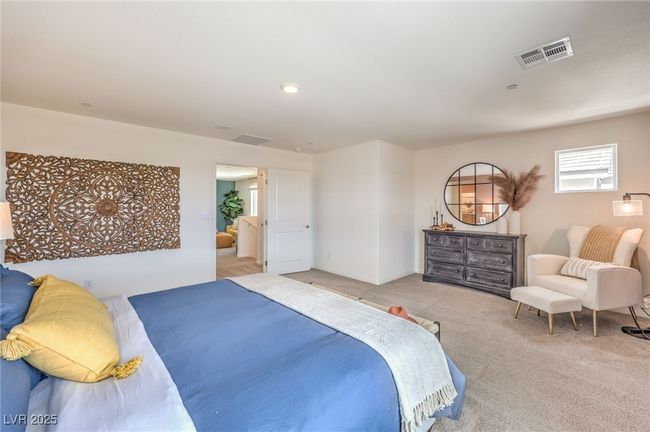 Photo is representational only; actual home finishes may vary. View of carpeted bedroom | Image 22