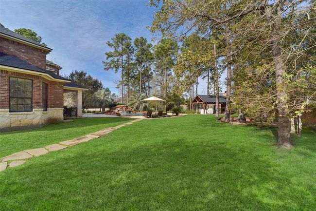 27603 Siandra Creek Ln, House other with 5 bedrooms, 5 bathrooms and 3 parking in Spring TX | Image 46