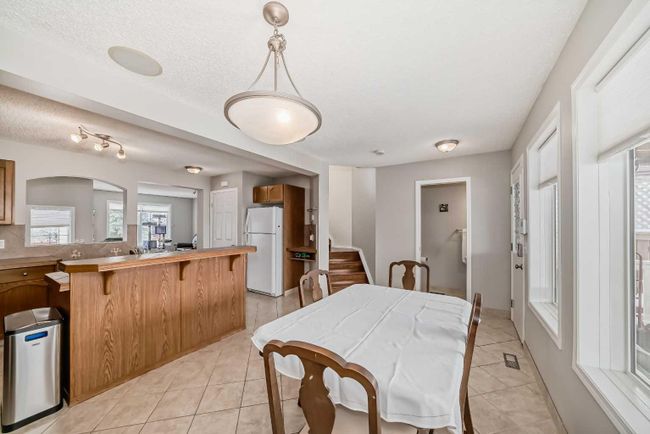 163 Eversyde Circle Sw, Home with 4 bedrooms, 2 bathrooms and 2 parking in Calgary AB | Image 12