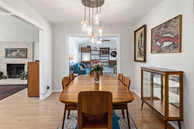 Dining area with view to Living room and Sun room when previously furnished | Image 10