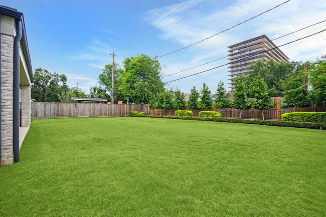 This expansive backyard offers endless possibilities—whether you envision a pool and spa, a sport court, lush gardens, or play space galore. With its generous size and privacy landscaping, it’s a true blank canvas ready to bring your outdoor dreams to life. | Image 35