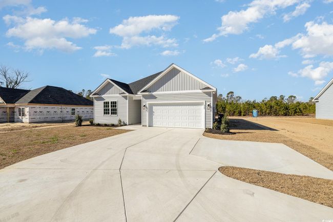 View of front of home featuring a garage | Image 4