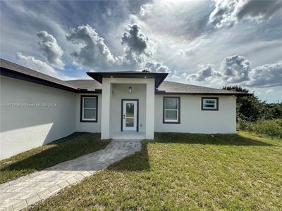 868 Cervantes, House other with 4 bedrooms, 2 bathrooms and null parking in Lehigh Acres FL | Image 2