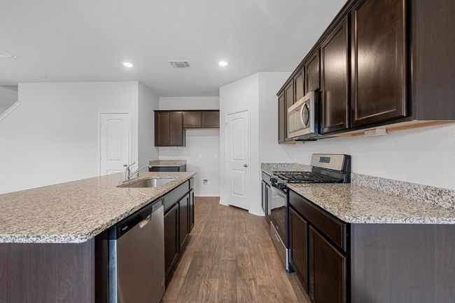 164 Frogmore Loop, House other with 4 bedrooms, 3 bathrooms and 2 parking in Uhland TX | Image 11