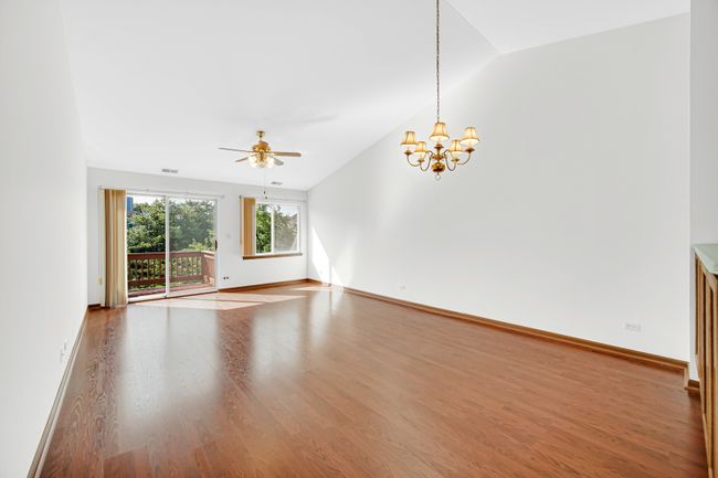 View from the living room into the kitchen. Built | Image 5