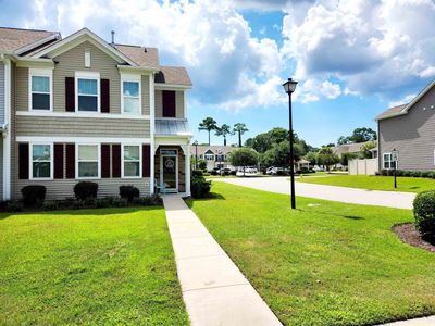 View of front of home with a front lawn | Image 1