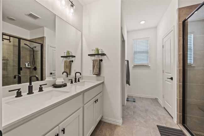 Master Bath With Walk-in Shower and Dual Sinks. | Image 17