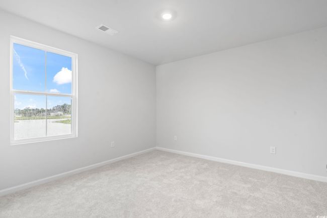 Unfurnished room featuring light carpet and baseboards | Image 6