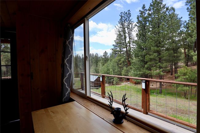 View of unfurnished sunroom | Image 38