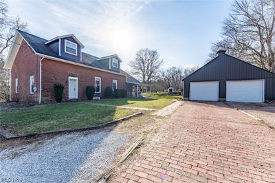 Front of House and detached 2 car garage | Image 1