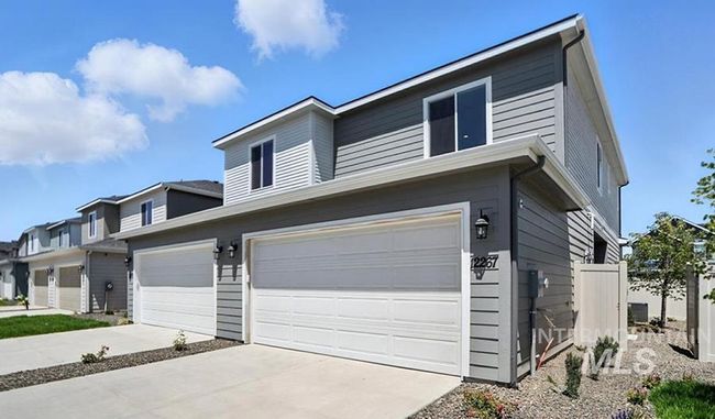 View of front of property with a garage and driveway | Image 27