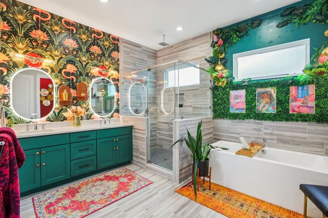 Bathroom with a stall shower, a tub to relax in, double vanity, recessed lighting, and wood finished floors | Image 22