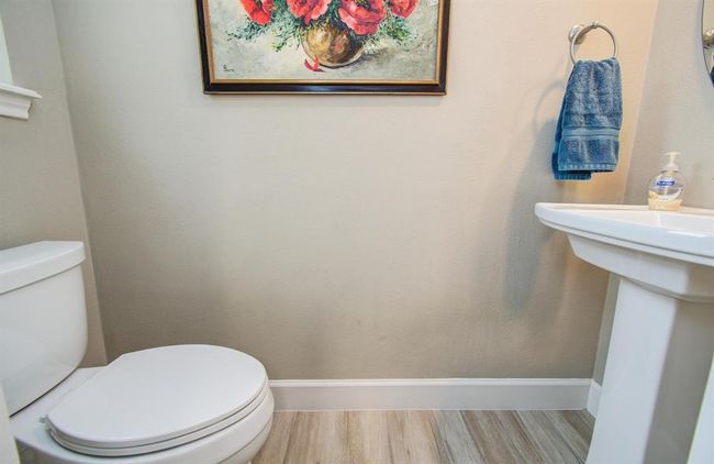 Half bath with pedestal sink. | Image 36