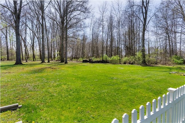 View of yard with fence | Image 35