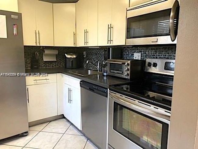 APT-225 - 3101 Nw 47 Th Ter, Condo with 1 bedrooms, 2 bathrooms and null parking in Lauderdale Lakes FL | Image 6