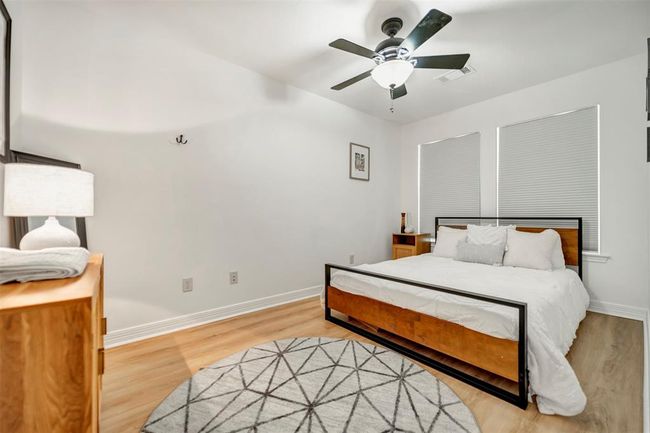 Room being used as secondary bedroom, could also be used as a study | Image 28