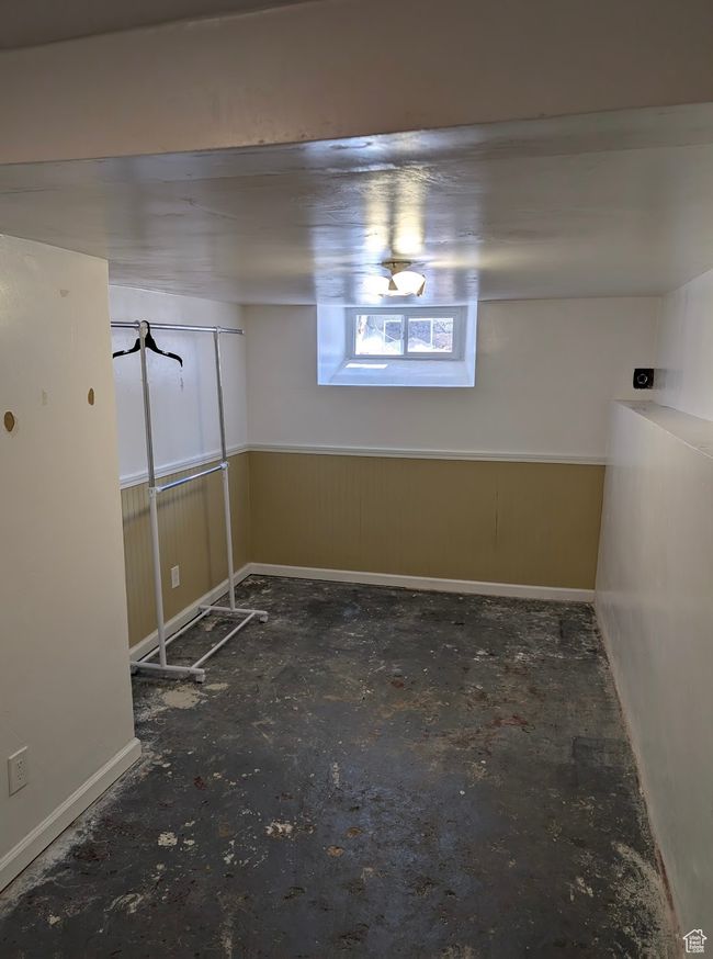 Basement with baseboards | Image 6