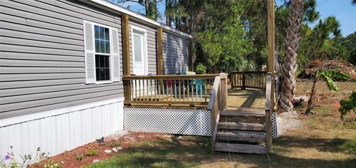 129 Canal Ave, Oak Hill, FL, 32759-9788 | Card Image
