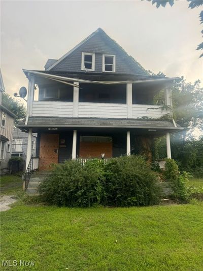 View of front of home with a front yard | Image 1