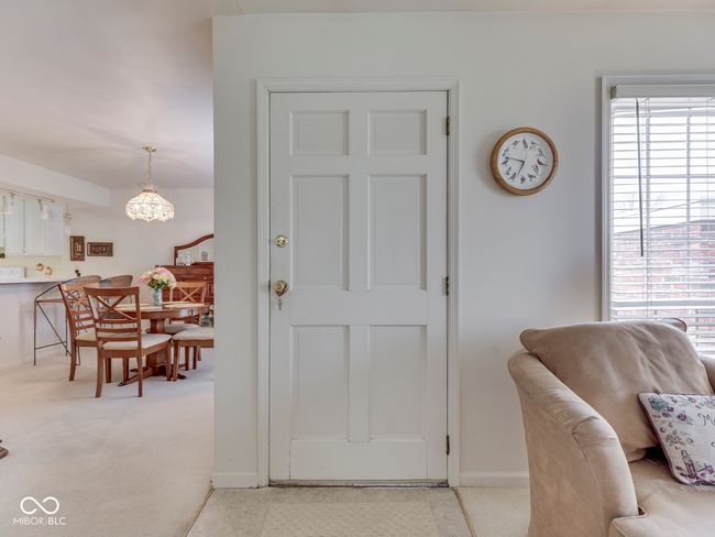 Front door opens to living room | Image 7