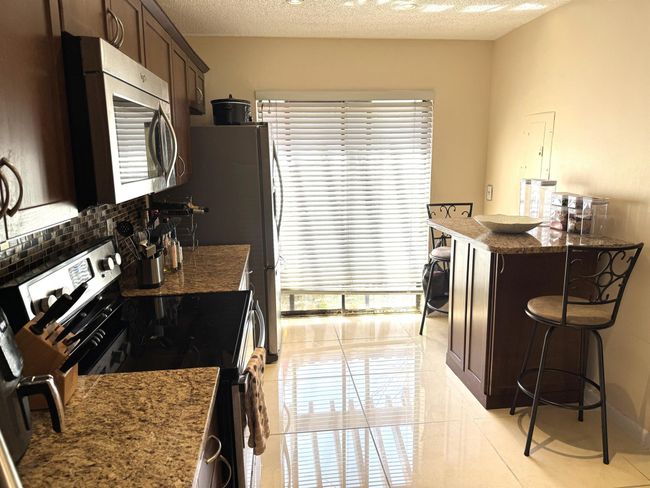 28102 - 3779 Carambola Cir N, Condo with 3 bedrooms, 3 bathrooms and null parking in Coconut Creek FL | Image 8
