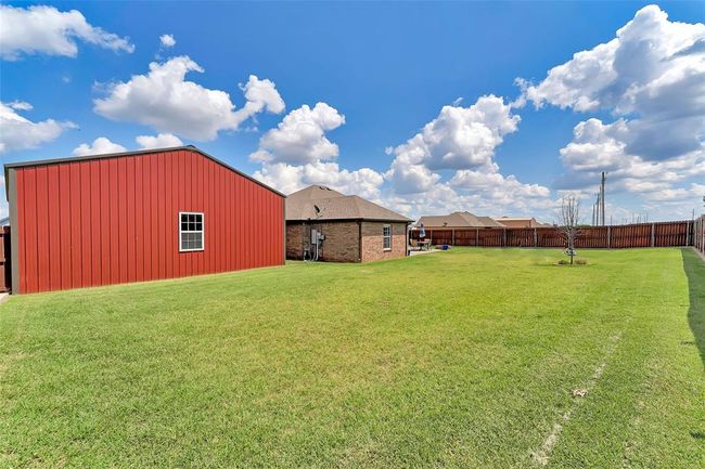 Backyard with privacy fenced in backyard. | Image 33
