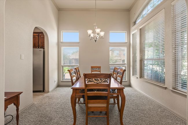 Formal dining with large windows | Image 7