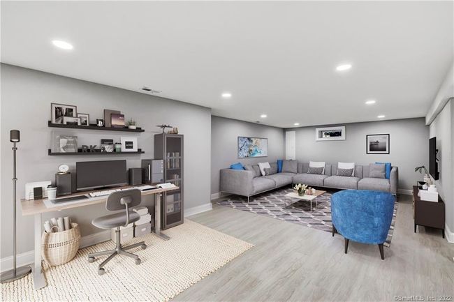Fully finished lower level virtually staged family room &amp; office. | Image 30