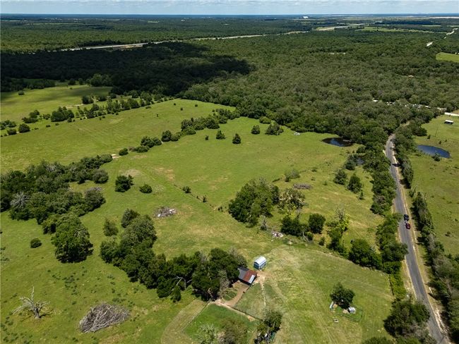 Aerial view of property's location featuring a forest | Image 10