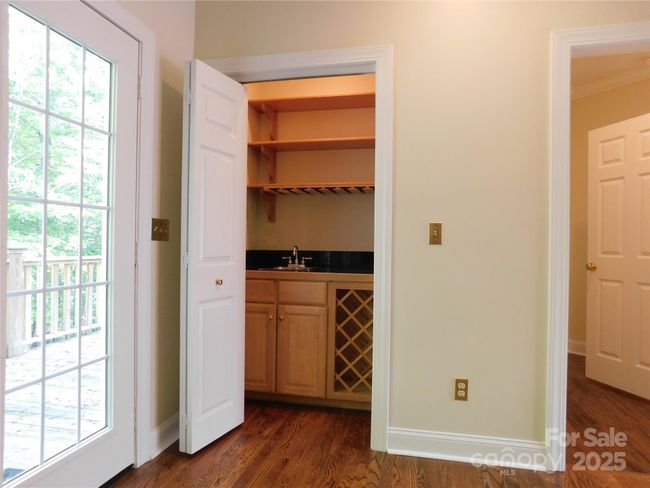 Serve yourself, or guests, your favorite wines, liqueurs, spirits, or coffees from the comfort of the living room. | Image 21