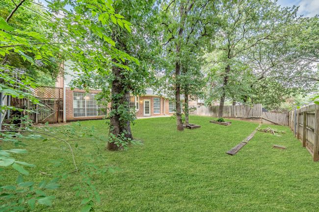 View of back of home. Lawn digitally enhanced. | Image 39