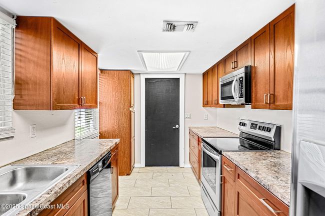 5993 Gilson Ave, House other with 3 bedrooms, 2 bathrooms and null parking in Cocoa FL | Image 11