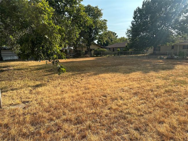 View of yard with fence | Image 37