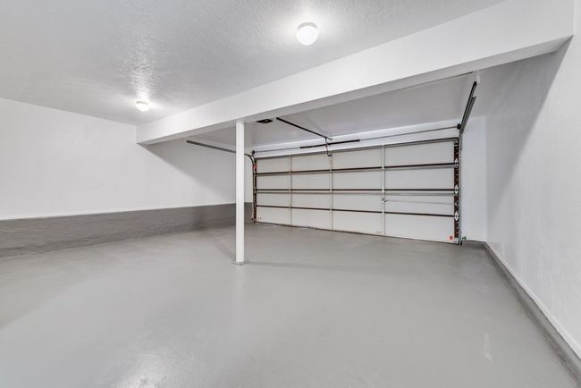 Garage featuring baseboards | Image 20