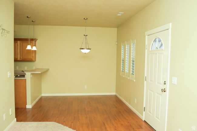 Interior space with light wood-type flooring and baseboards | Image 4
