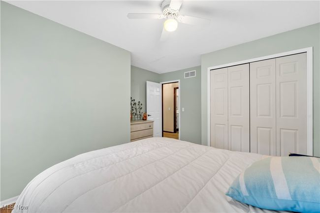 BEDROOM FEATURES LARGE CLOSET AND CEILING FAN/LIGHT | Image 22