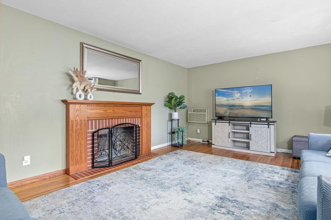 There is a wall AC unit that is no longer used. The home has working central AC! | Image 5