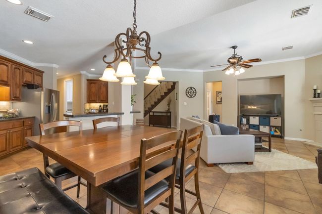 Breakfast room open to den | Image 11