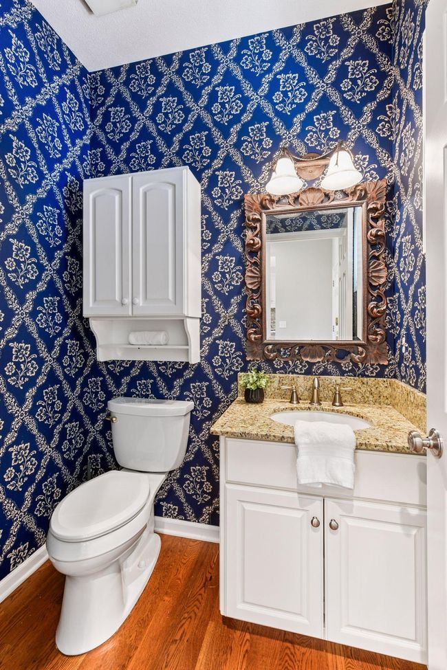 Absolutely charming main floor powder room. | Image 16