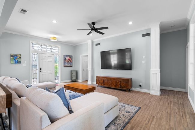 sit back and relax in this gorgeous family room | Image 6