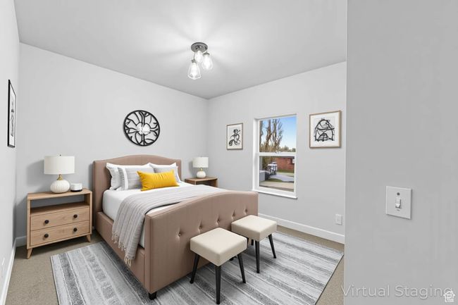 Bedroom with light colored carpet and baseboards | Image 25