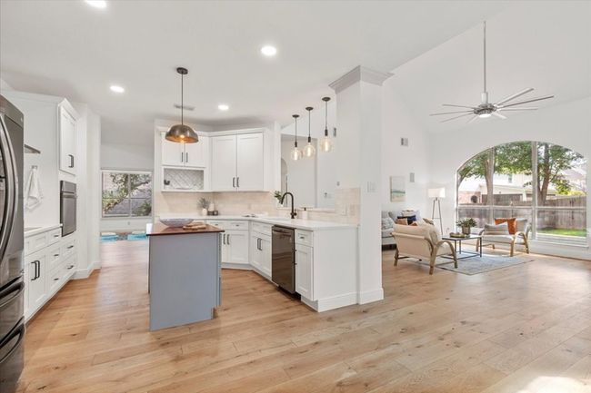 Open kitchen with living and dining views | Image 9