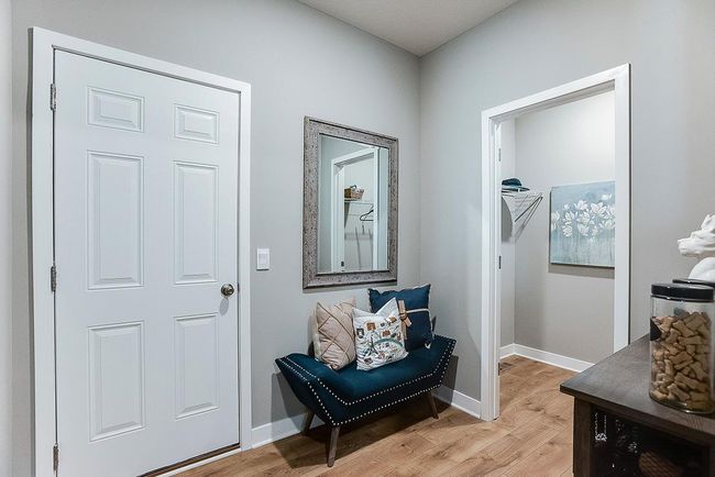 Plenty of storage space in this mud room with walk-in closet. | Image 15