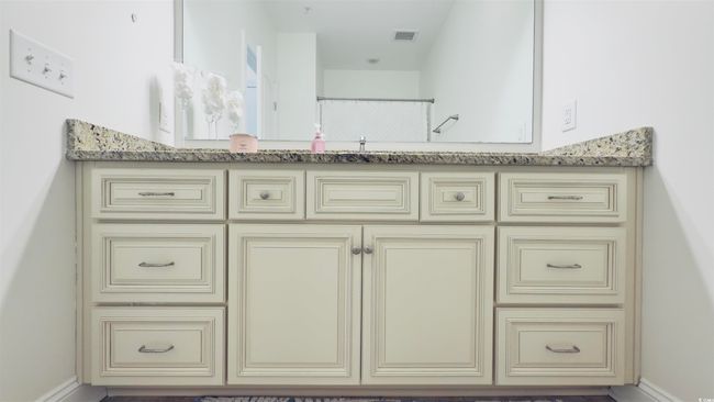 Bathroom with a sink | Image 30