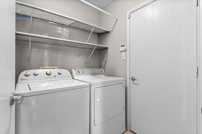 Laundry room with separate washer and dryer | Image 26