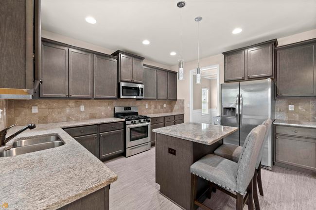 3015 Button Cir, House other with 4 bedrooms, 3 bathrooms and null parking in Loganville GA | Image 19