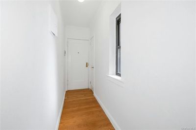 Entryway with long corridor and closet | Image 3