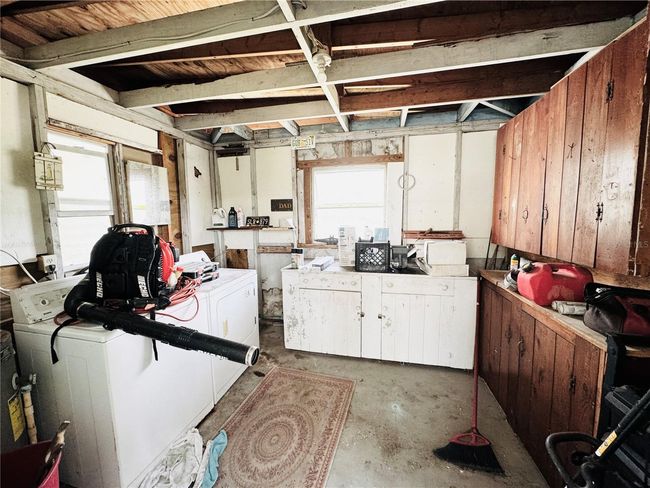 laundry area off the back side of the house | Image 48