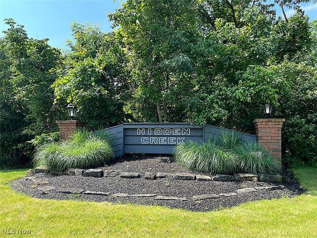 Community / neighborhood sign featuring a lawn | Image 26